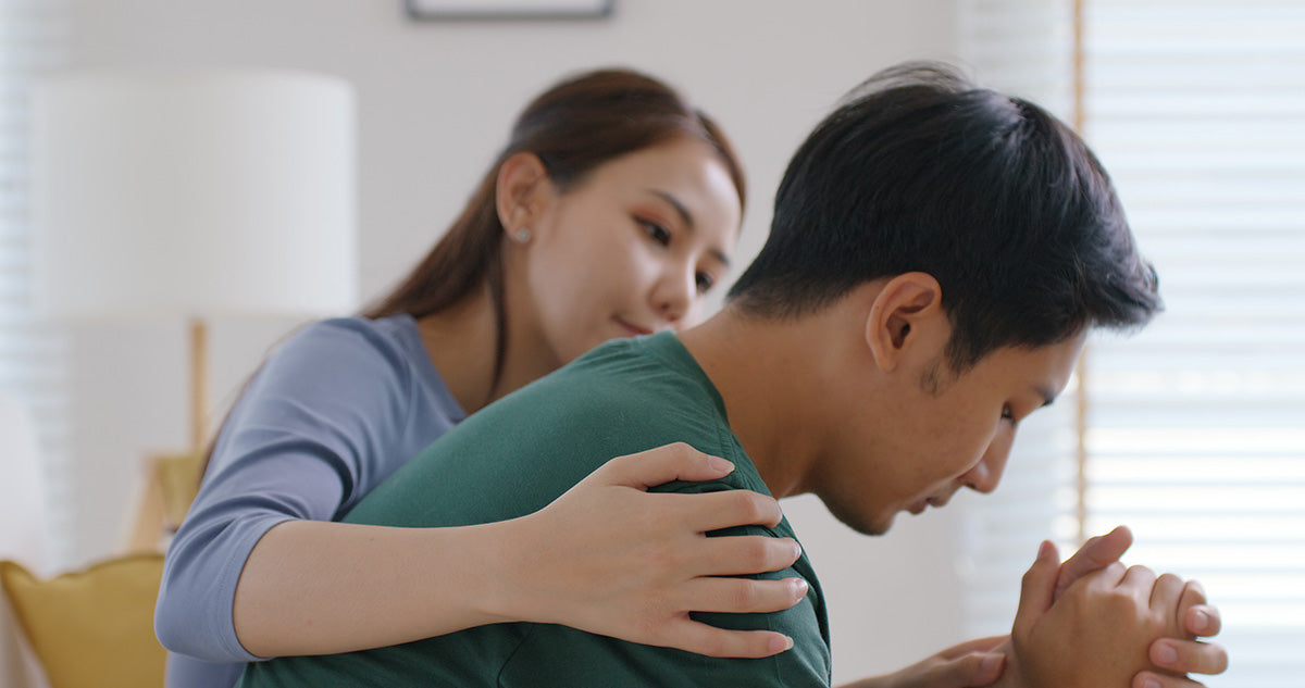 Woman comforting a guy