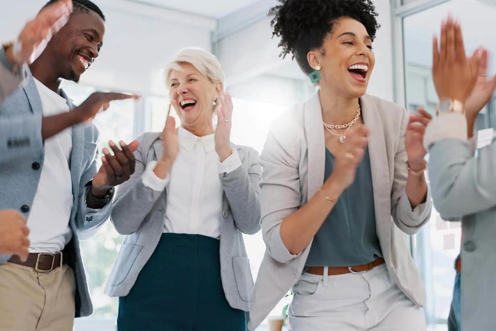 Employees celabrating success